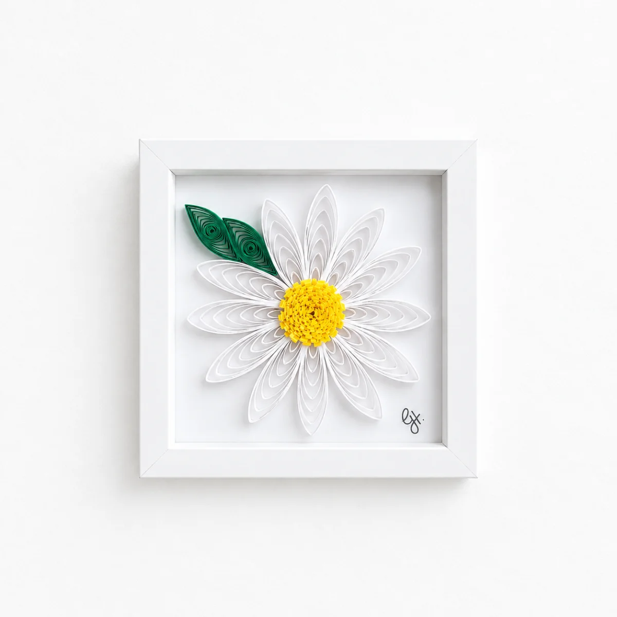 Quilled white daisy flower in a white shadowbox frame