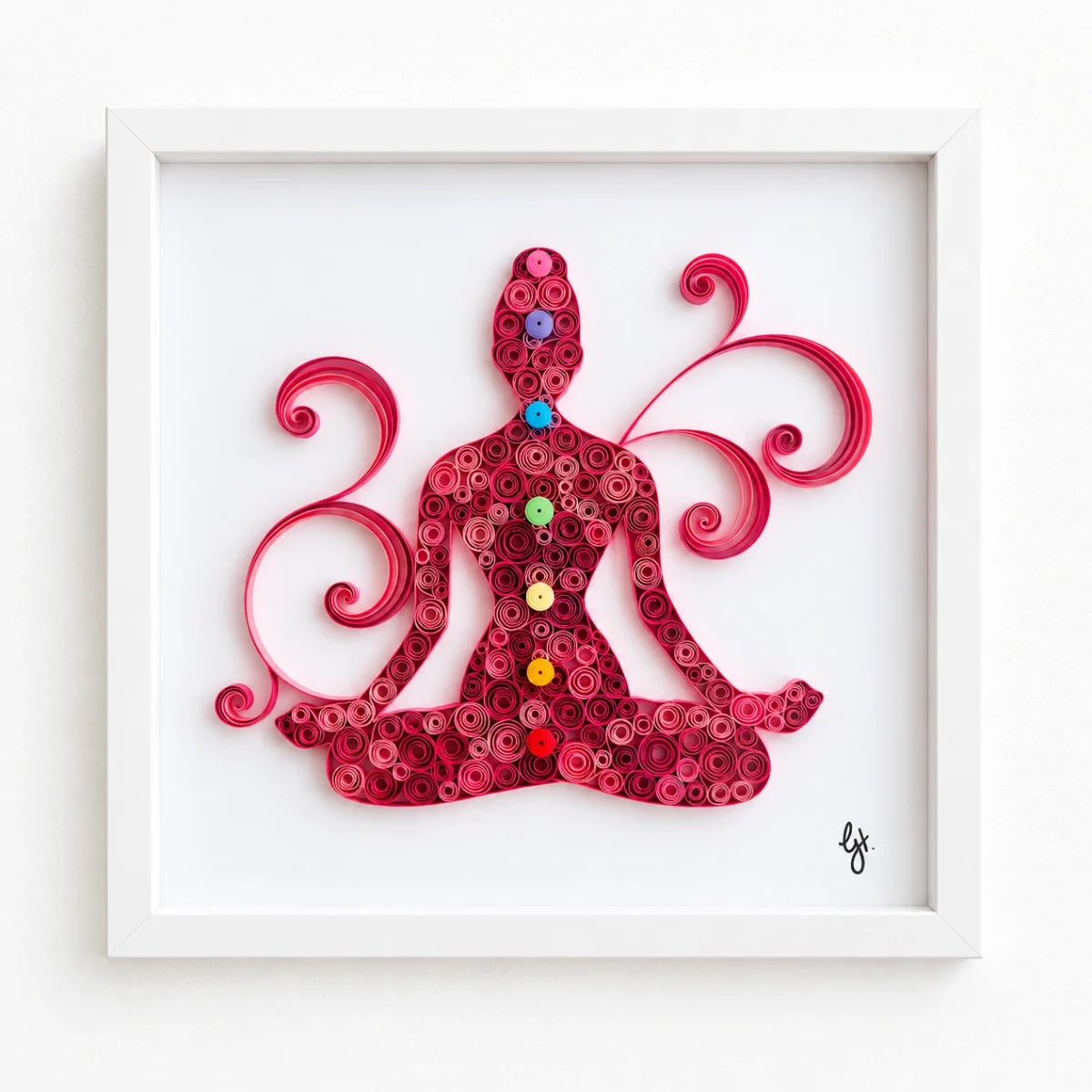 In Still with Chakras quilled meditating figure with chakra colours in a white shadowbox frame