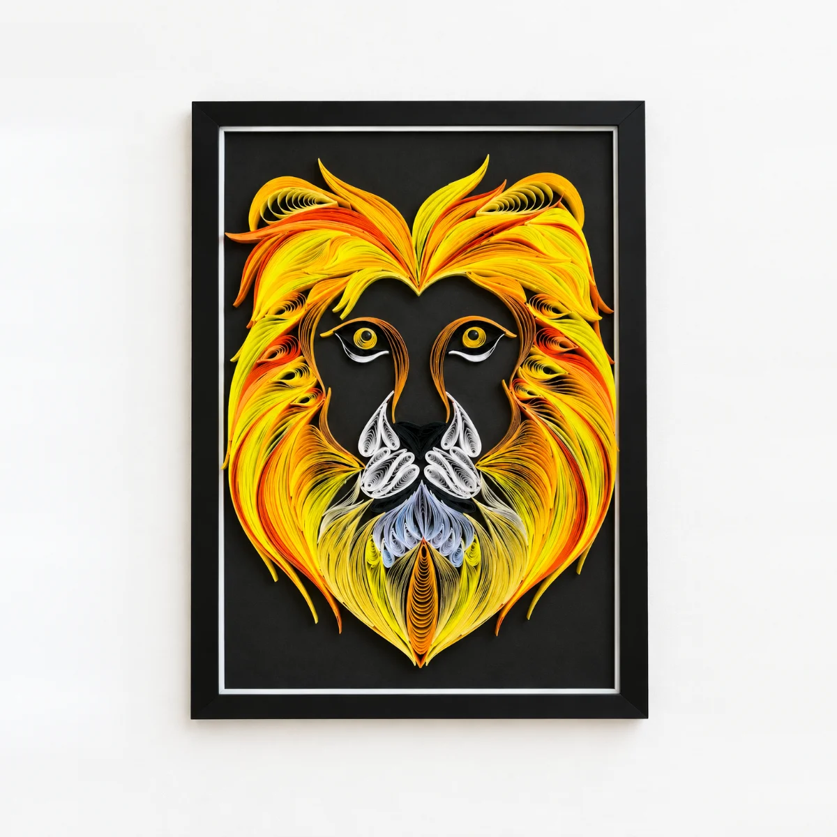 King of the Wild quilled lion artwork in a black frame