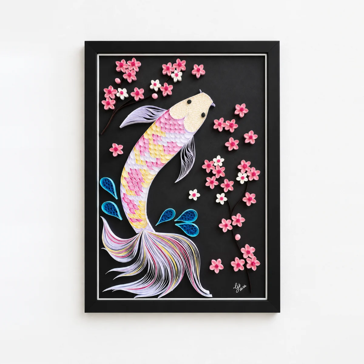 Koi in Motion quilled koi fish artwork in a black frame